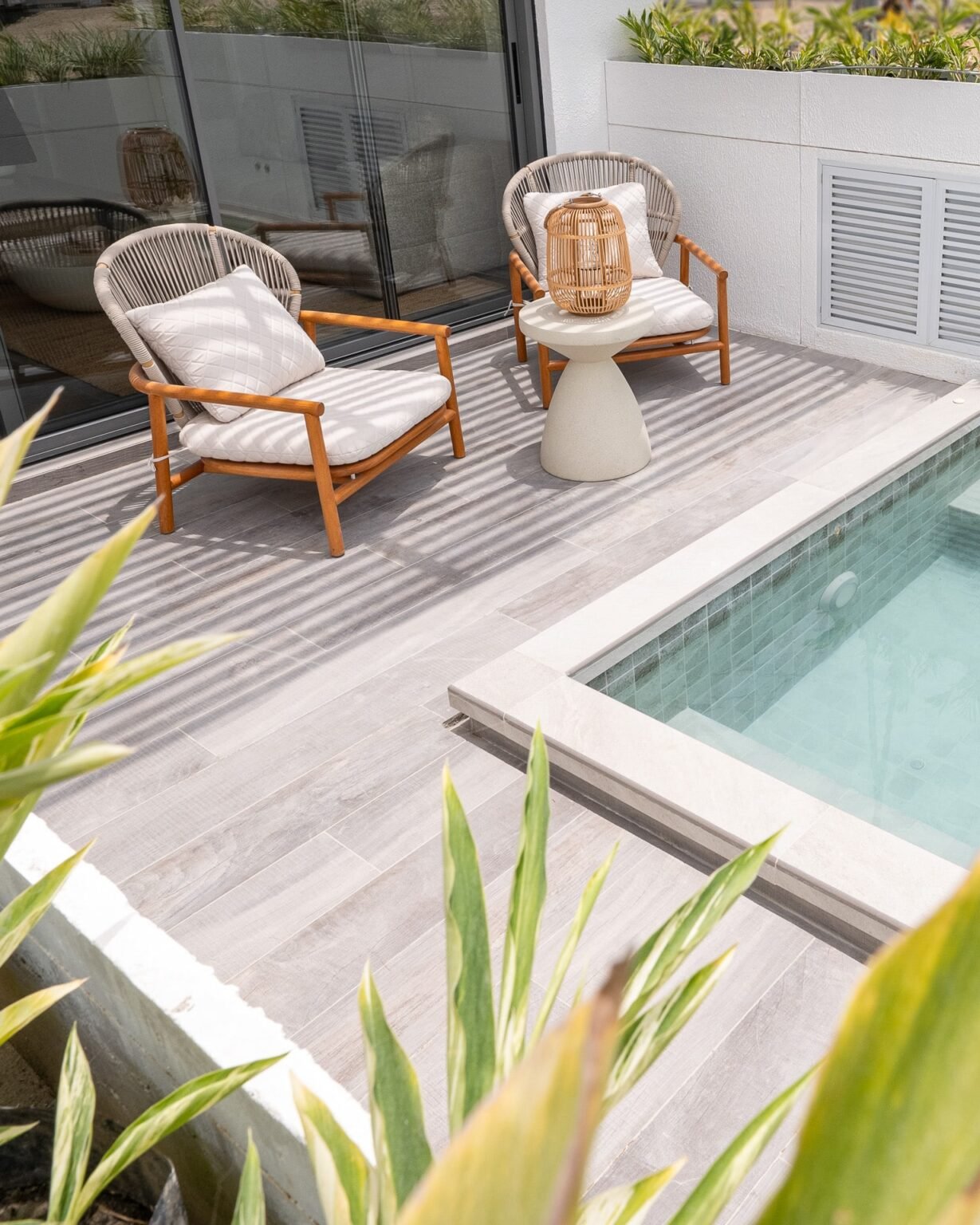 Villa plunge-pool terrace with lounge chairs